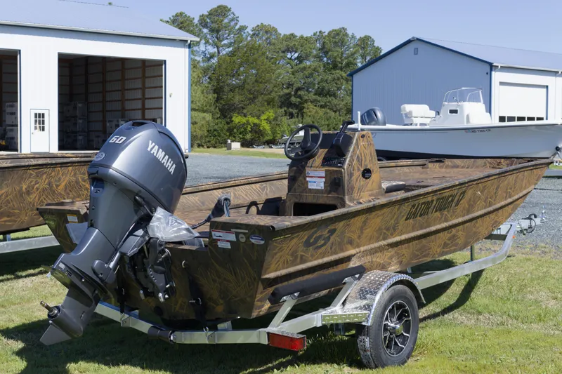 Slide: The Image of 2026 G3 Gator Tough 17 CC boat with Yamaha 60 engine on trailer. - 3