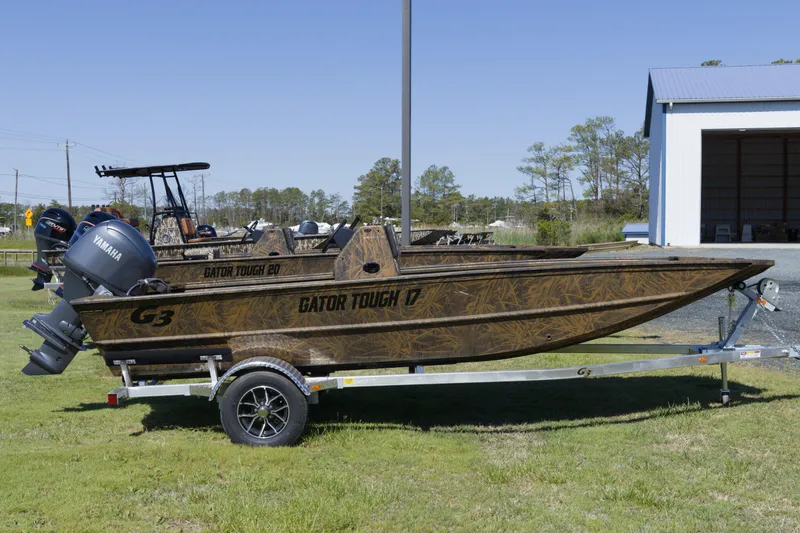 Slide: The Image of 2026 G3 Gator Tough 17 CC boat on trailer, featuring Yamaha outboard motor. - 4