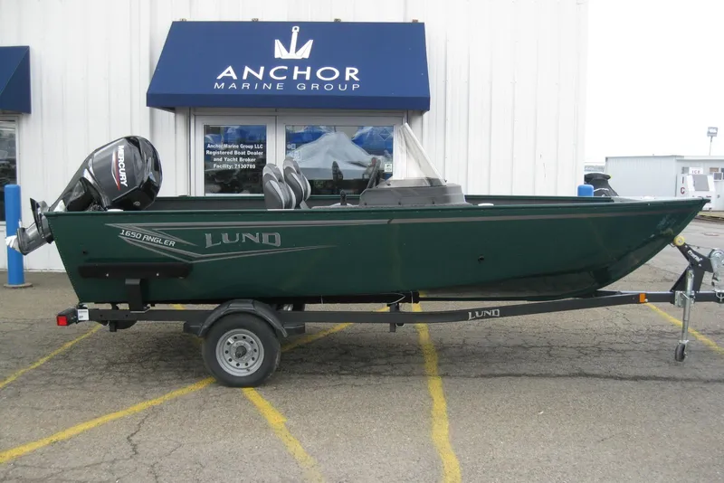 Slide: The Image of 2026 Lund 1650 Angler SS boat on trailer at Anchor Marine Group. - 2