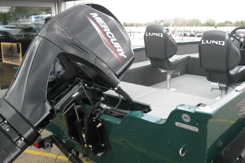 Slide: The Image of 2026 Lund 1650 Angler SS boat with Mercury outboard motor and dual seats. - 5