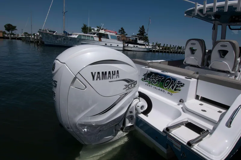 Slide: The Image of 2023 Sportsman Heritage 261 Center Console with Yamaha XTO engine at dock. - 17