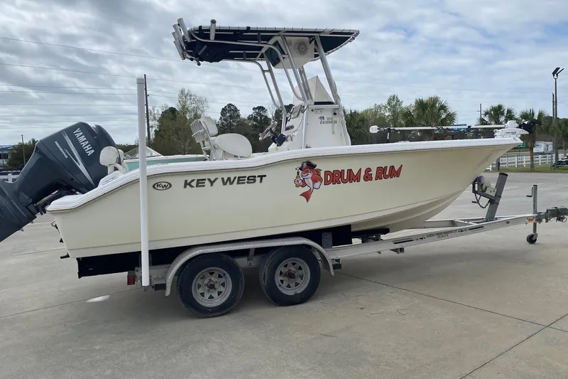The Image of 2010 Key West 211 Center Console boat on trailer with Yamaha engine. - 0