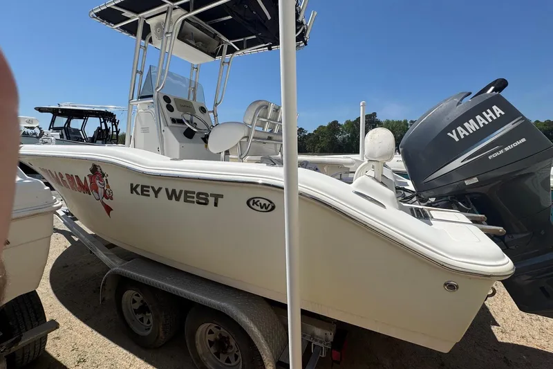 Slide: The Image of 2010 Key West 211 Center Console boat with Yamaha engine on trailer. - 4