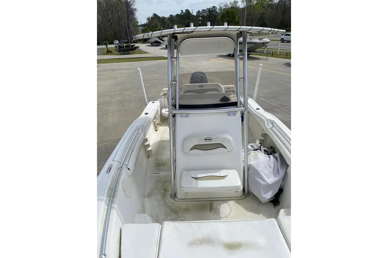 Slide: The Image of 2010 Key West 211 Center Console boat interior with seating and storage. - 7