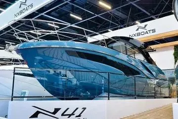 The Image of 2026 NX Boats NX41 HORIZON luxury yacht displayed at a boat show. - 1