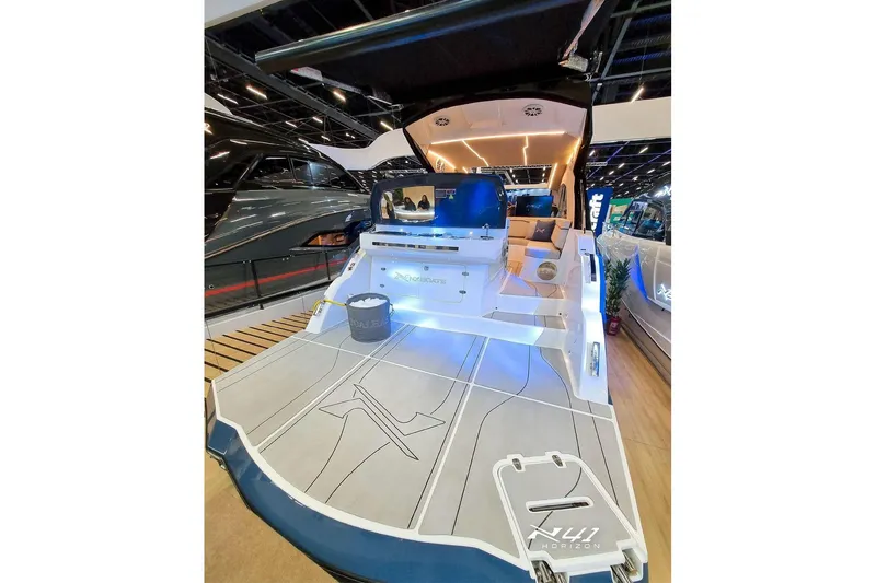 Slide: The Image of 2026 NX Boats NX41 HORIZON luxury yacht interior with modern design and ambient lighting. - 10