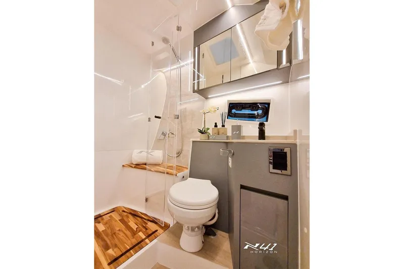 Slide: The Image of Luxurious bathroom in 2026 NX Boats NX41 HORIZON, featuring modern fixtures and elegant design. - 13
