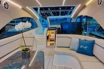 Slide: The Image of Luxurious interior of 2026 NX Boats NX41 HORIZON with modern seating and elegant decor. - 2