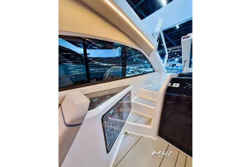 Slide: The Image of Interior view of 2026 NX Boats NX41 HORIZON, showcasing sleek design and modern features. - 23