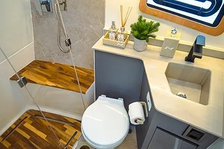 Slide: The Image of Luxurious bathroom in 2026 NX Boats NX41 HORIZON with modern fixtures and wooden accents. - 37