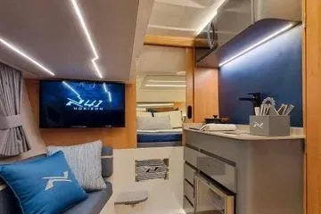 Slide: The Image of Luxurious interior of 2026 NX Boats NX41 HORIZON with modern amenities and stylish design. - 5