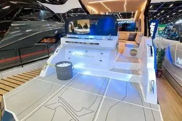 Slide: The Image of 2026 NX Boats NX41 HORIZON luxury yacht interior with modern design and ambient lighting. - 8
