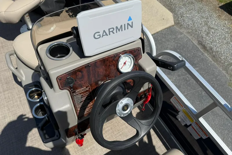 Slide: The Image of 2023 Sun Tracker Bass Buggy 16 XL Select dashboard with Garmin navigation system. - 14