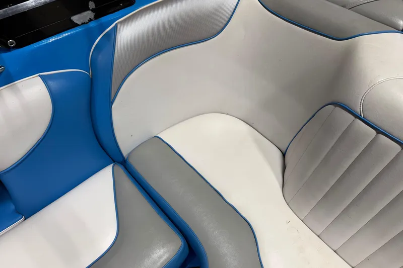 Slide: The Image of Blue and white interior seating of a 2016 Sanger V237 S boat. - 20