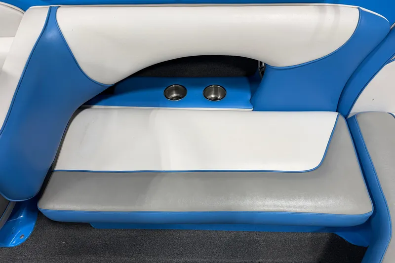 Slide: The Image of Blue and white seating with cup holders in 2016 Sanger V237 S boat. - 21