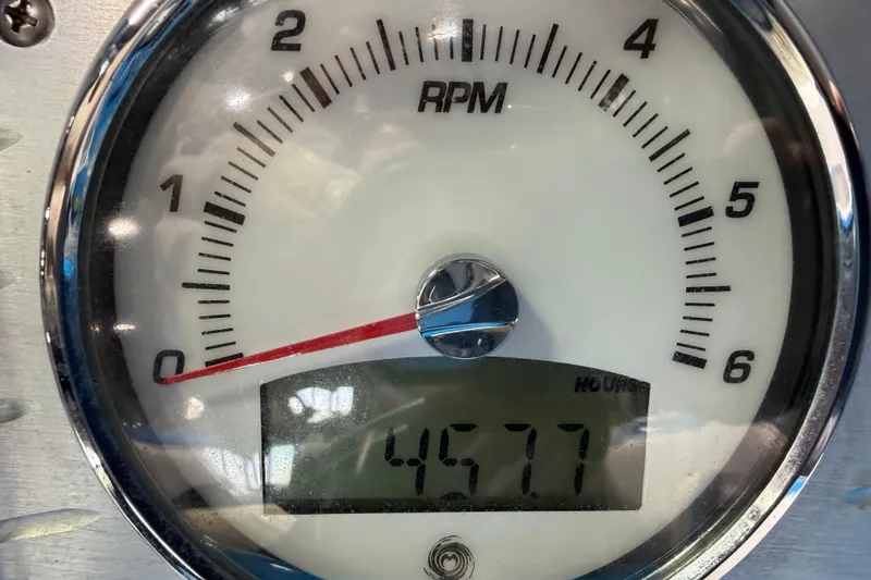 Slide: The Image of RPM gauge of 2016 Sanger V237 S showing 4577 hours. - 24