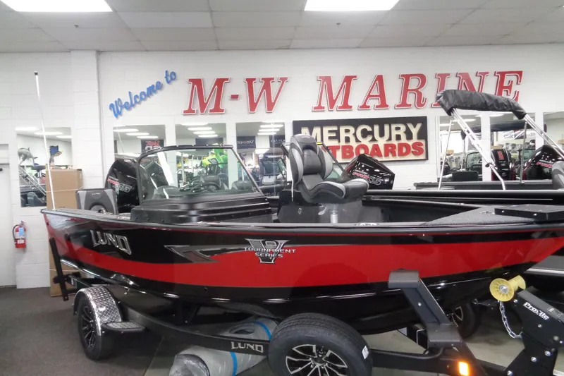 The Image of 2026 Lund 1875 Pro-V boat displayed at M-W Marine showroom. - 0