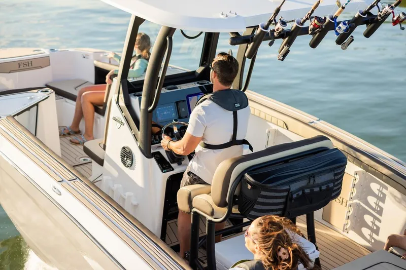 Slide: The Image of Yamaha 255 FSH Sport E 2026 on water with fishing gear. - 7