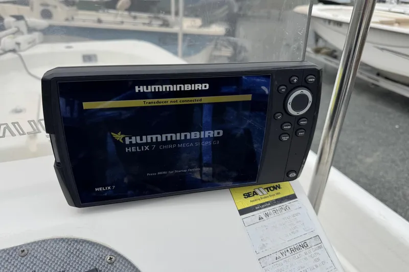 Slide: The Image of Humminbird Helix 7 fish finder on 2012 Carolina Skiff 1765 DLX boat dashboard. - 9