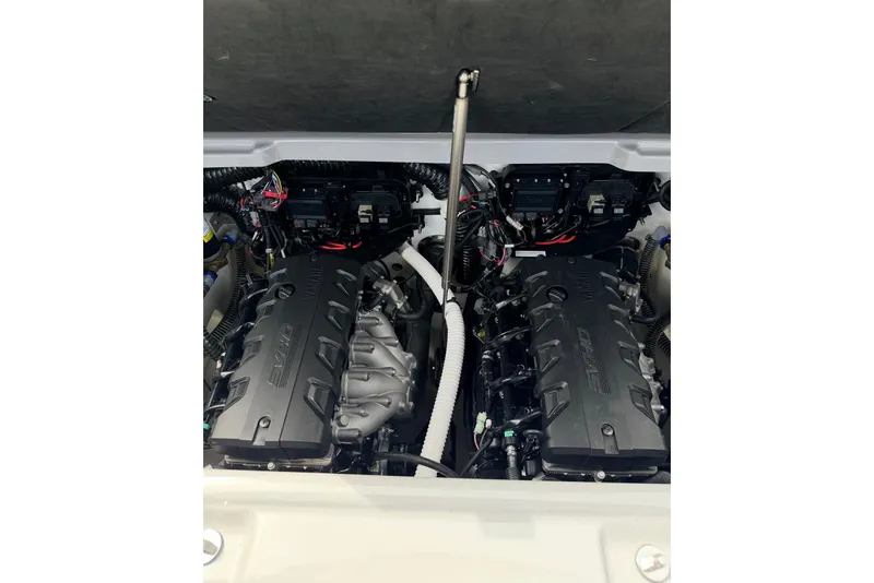 Slide: The Image of 2026 Yamaha Boats 255XD engine compartment showcasing dual engines and advanced components. - 20