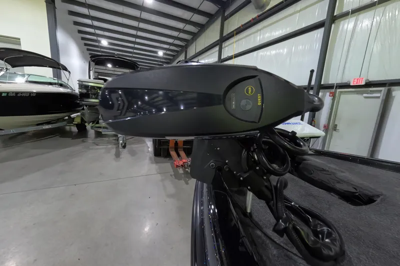 Slide: The Image of 2023 Phoenix 921 Elite boat in showroom, featuring advanced trolling motor. - 11