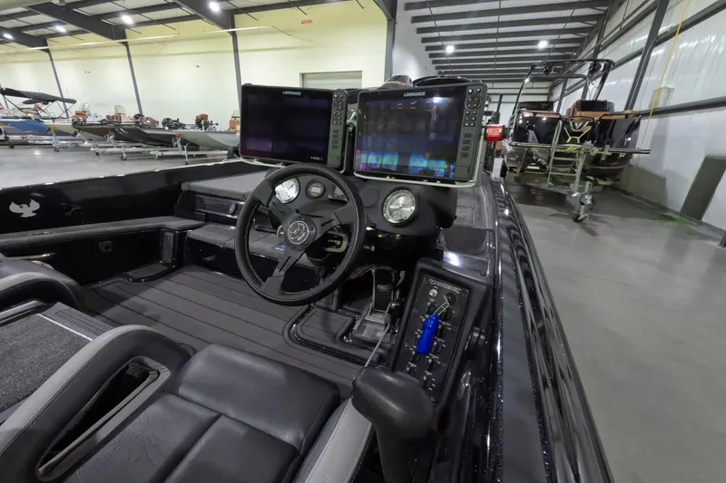 Slide: The Image of Interior of 2023 Phoenix 921 Elite boat with advanced navigation systems. - 3
