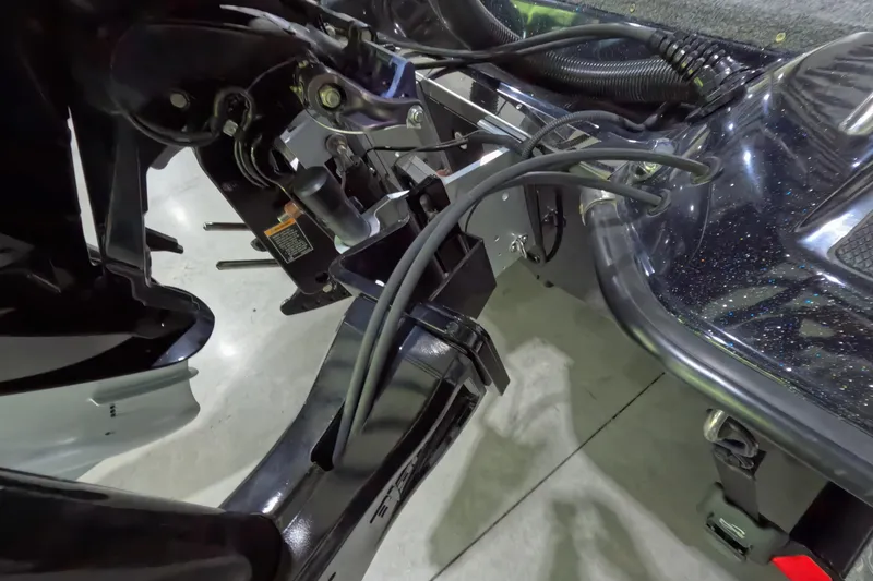 Slide: The Image of Close-up of 2023 Phoenix 921 Elite boat's engine components and wiring. - 5