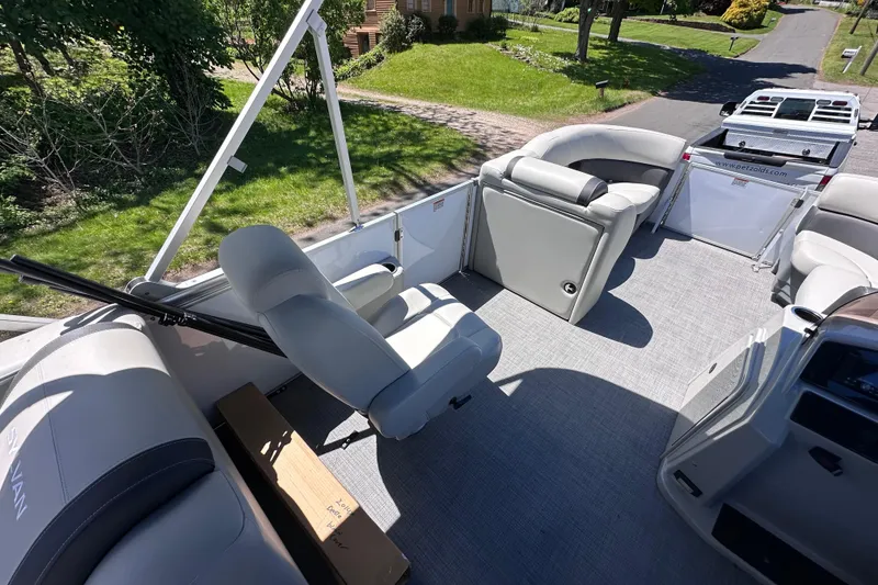 Slide: The Image of 2024 Sylvan Mirage 8522 LZ pontoon boat interior with plush seating and modern design. - 11