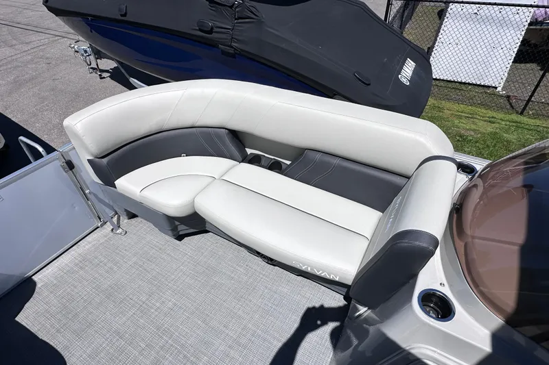 Slide: The Image of 2024 Sylvan Mirage 8522 LZ boat with luxurious seating and modern design. - 20