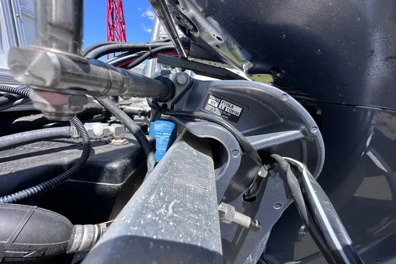 Slide: The Image of Close-up of 2024 Sylvan Mirage 8522 LZ boat engine components and wiring. - 32