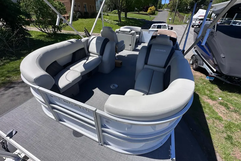 Slide: The Image of 2024 Sylvan Mirage 8522 LZ pontoon boat with luxurious seating and modern design. - 7