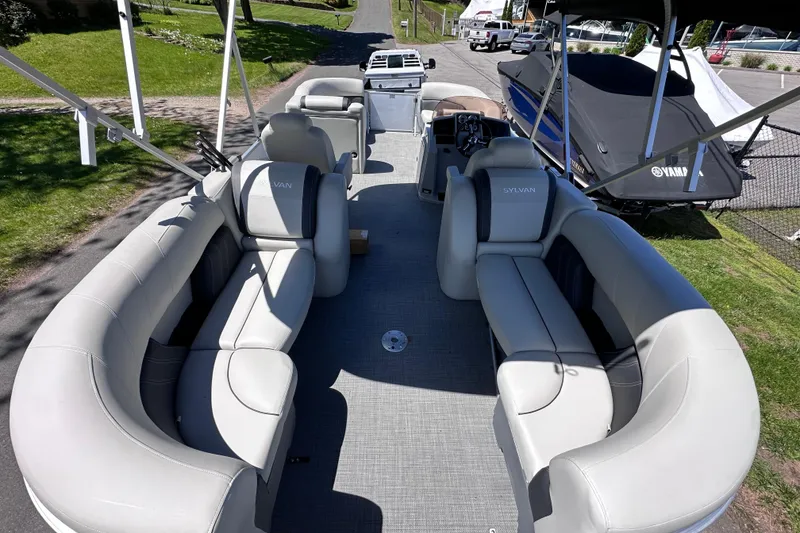 Slide: The Image of 2024 Sylvan Mirage 8522 LZ pontoon boat with spacious seating and modern design. - 8