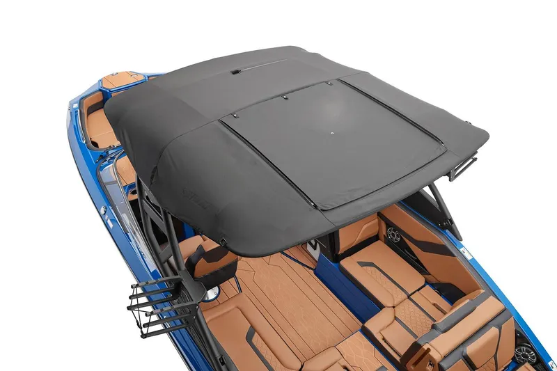 Slide: The Image of Manufacturer Provided Image: 2026 Yamaha Boats 255XD with black canopy and tan seating, top view. - 3