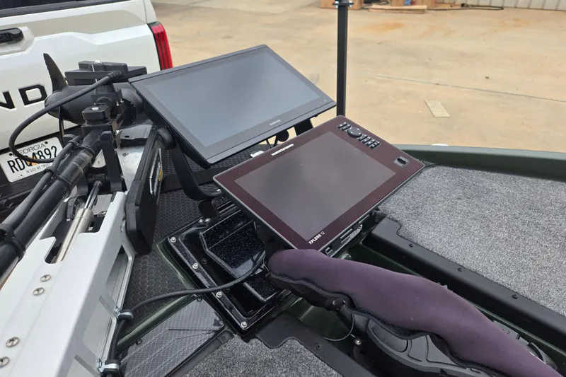 Slide: The Image of Dual monitors on a 2026 Phoenix 921 Elite X boat, showcasing advanced navigation technology. - 24