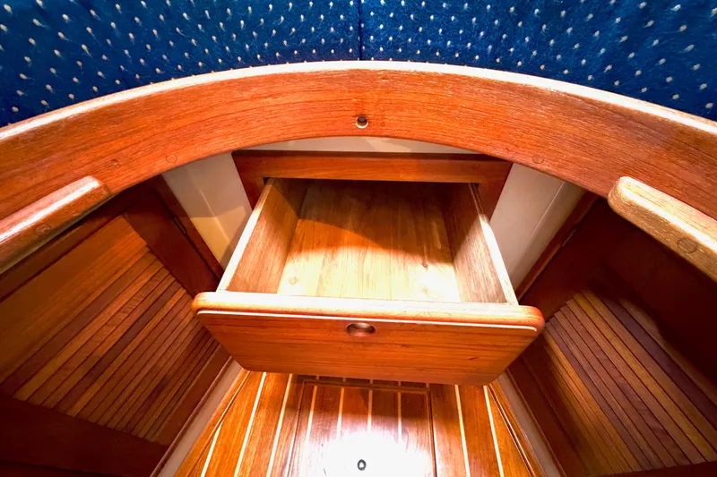 Slide: The Image of Interior wooden drawer on a 1992 Island Packet 29 sailboat. - 36