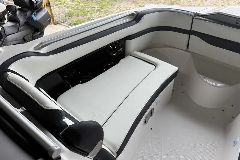 Slide: The Image of 2026 Yamaha Boats 275SD interior with sleek seating and modern design. - 12