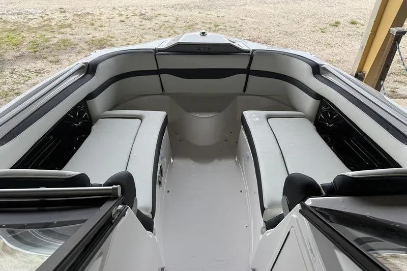 Slide: The Image of 2026 Yamaha Boats 275SD interior with spacious seating and sleek design. - 14