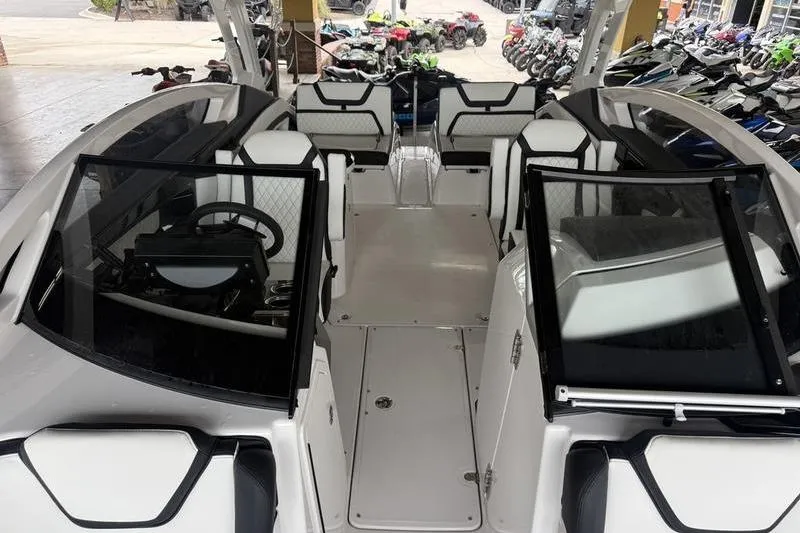 Slide: The Image of Interior view of 2026 Yamaha Boats 275SD, showcasing sleek seating and modern design. - 15