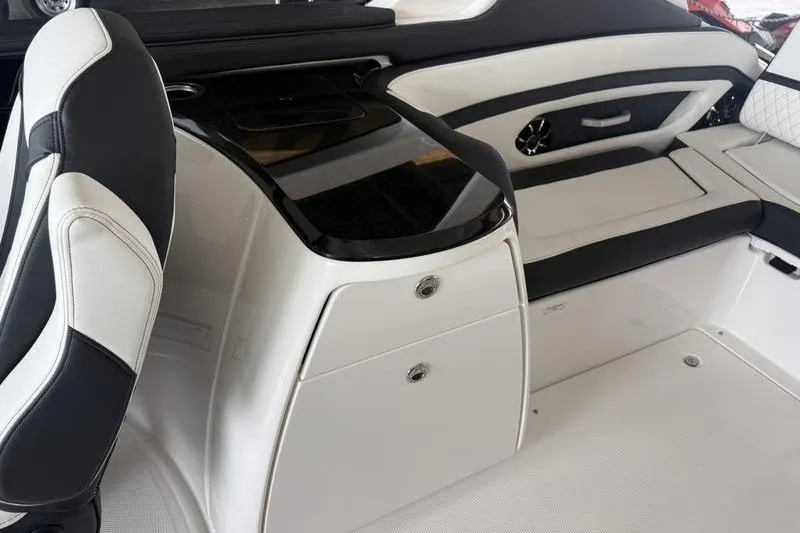 Slide: The Image of Interior of 2026 Yamaha Boats 275SD, featuring sleek seating and modern design elements. - 16