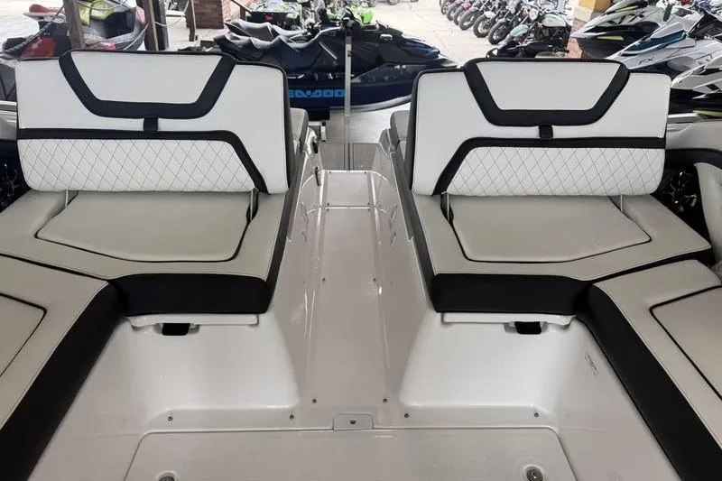Slide: The Image of 2026 Yamaha Boats 275SD interior seating with sleek, modern design and comfortable upholstery. - 17