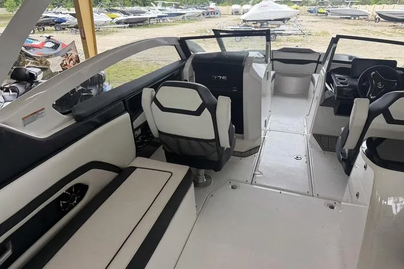 Slide: The Image of Interior of 2026 Yamaha Boats 275SD, featuring sleek seating and modern design elements. - 2