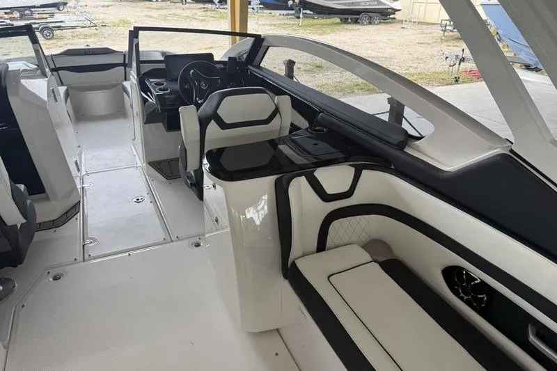 Slide: The Image of Interior of 2026 Yamaha Boats 275SD, featuring sleek seating and modern design. - 3