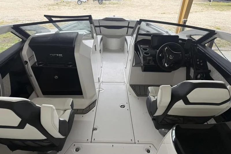 Slide: The Image of 2026 Yamaha Boats 275SD interior with modern seating and sleek dashboard design. - 4