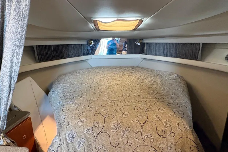 Slide: The Image of Interior cabin of a 2001 Formula 34 Performance Cruiser with a cozy bed. - 15