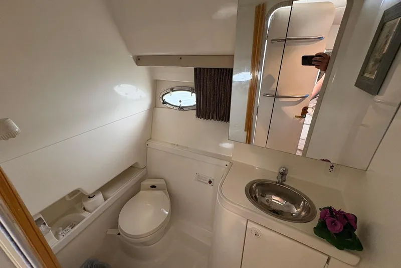 Slide: The Image of Bathroom interior of 2001 Formula 34 Performance Cruiser with sink and toilet. - 18