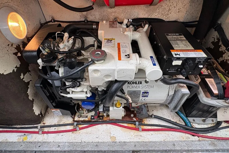 Slide: The Image of Engine compartment of a 2001 Formula 34 Performance Cruiser with Kohler power system. - 24