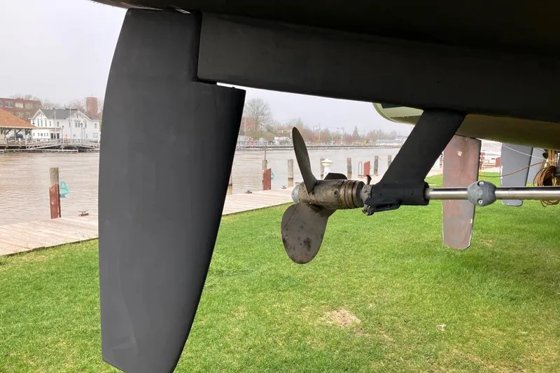 Slide: The Image of Propeller and rudder of a 1994 Sabre 362 sailboat on grassy shore. - 12