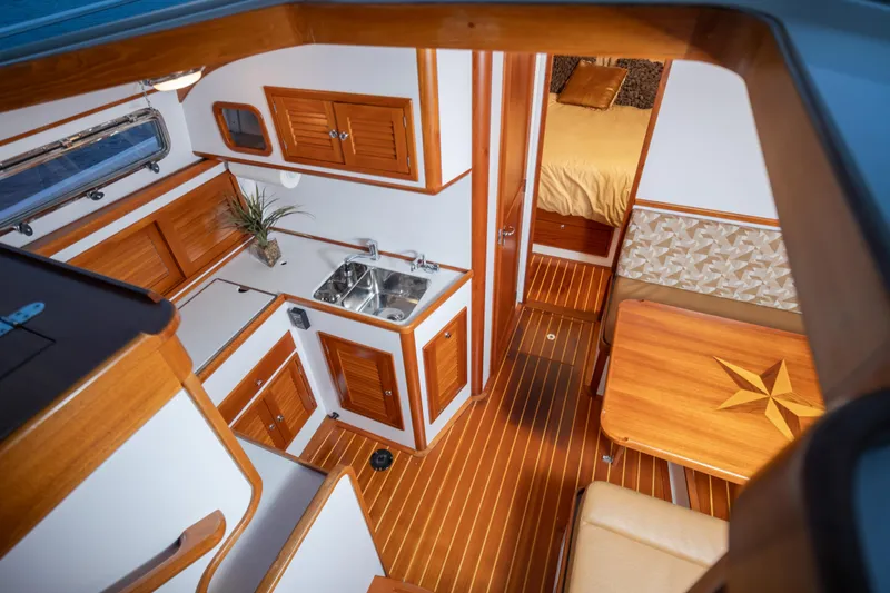 Slide: The Image of Luxurious 2007 Bruckmann BLUESTAR yacht interior with wood finishes and modern amenities. - 15