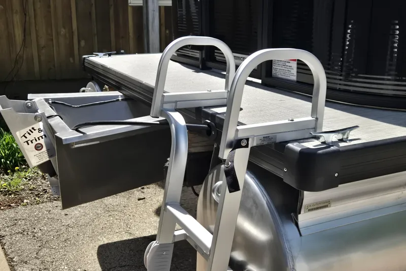 Slide: The Image of 2026 Princecraft Brio 17 Electric boat with ladder and tilt trim feature. - 12