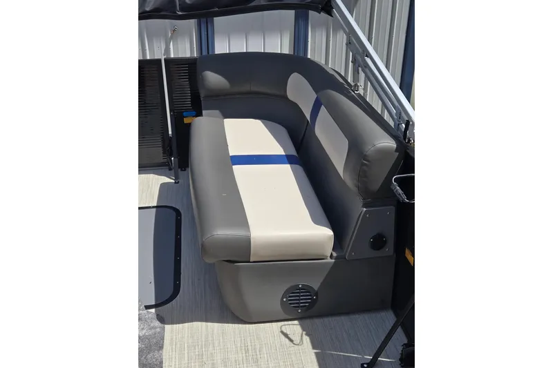 Slide: The Image of Interior seating of 2026 Princecraft Brio 17 Electric boat, featuring gray and beige upholstery. - 13